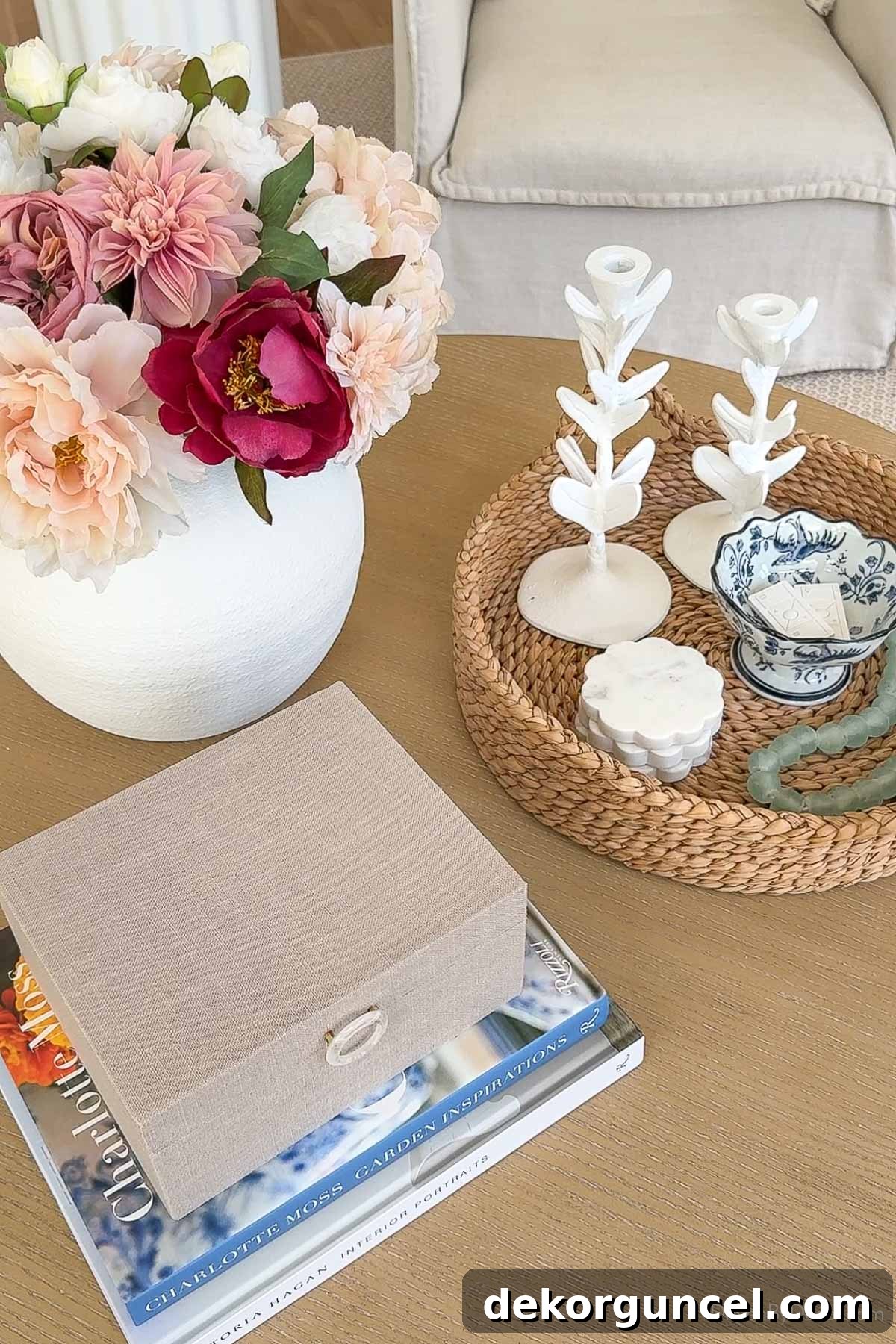 Round coffee table decor in a triangular arrangement 