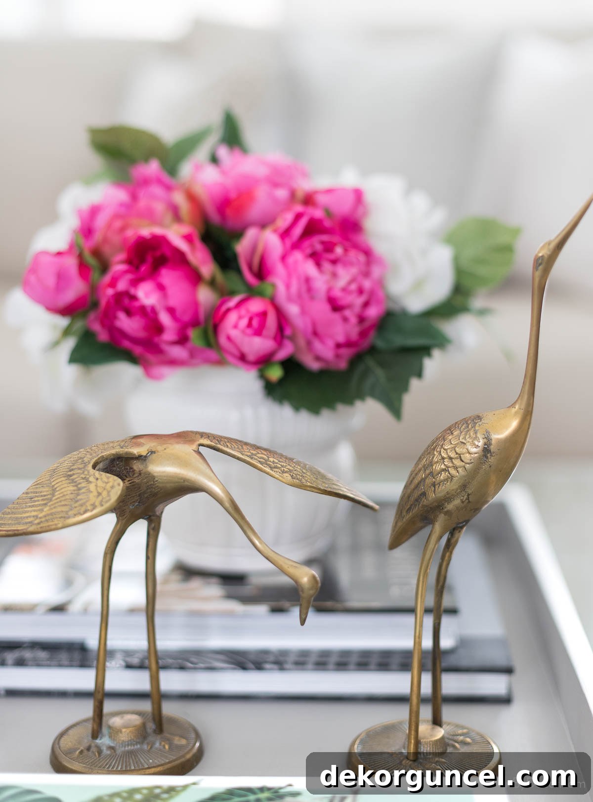 Brass cranes as coffee table decor