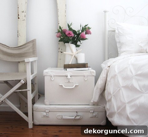 Paint a pair of old suitcases and stack them to create a unique nightstand!