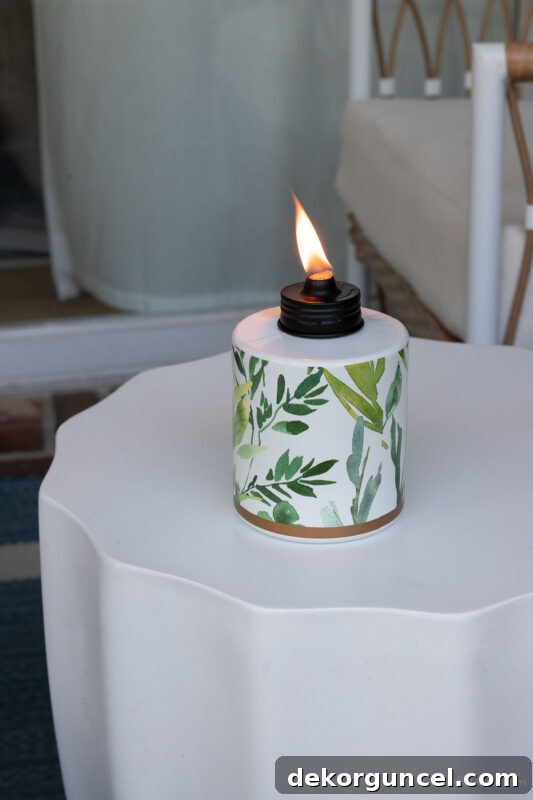 Tabletop tiki torch with greenery design for outdoor ambiance and mosquito control