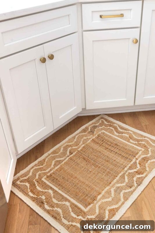Natural patterned rug in front of kitchen sink