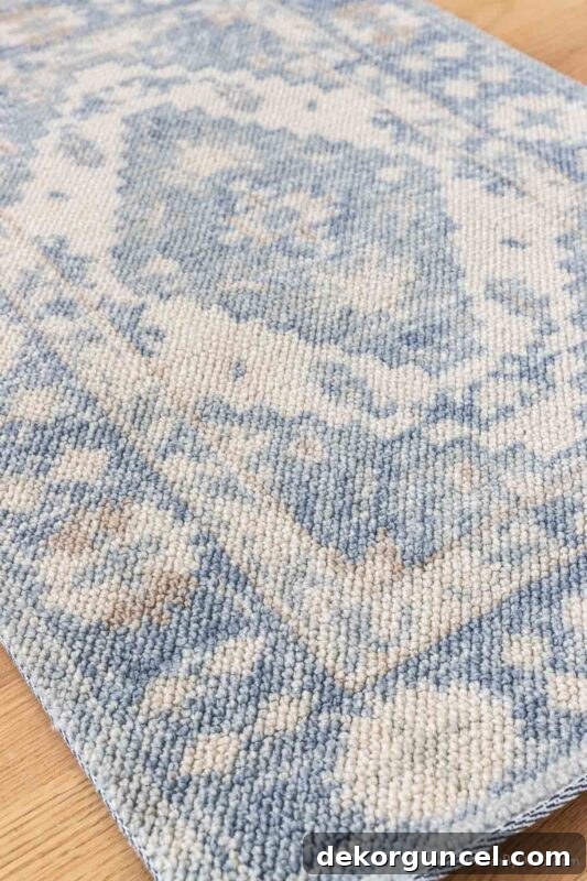 Oriental style rug with blues that are perfect for a living room, combining traditional design with updated colors