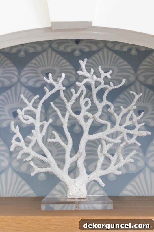 Faux coral decor piece with acrylic base lending a natural coastal vibe
