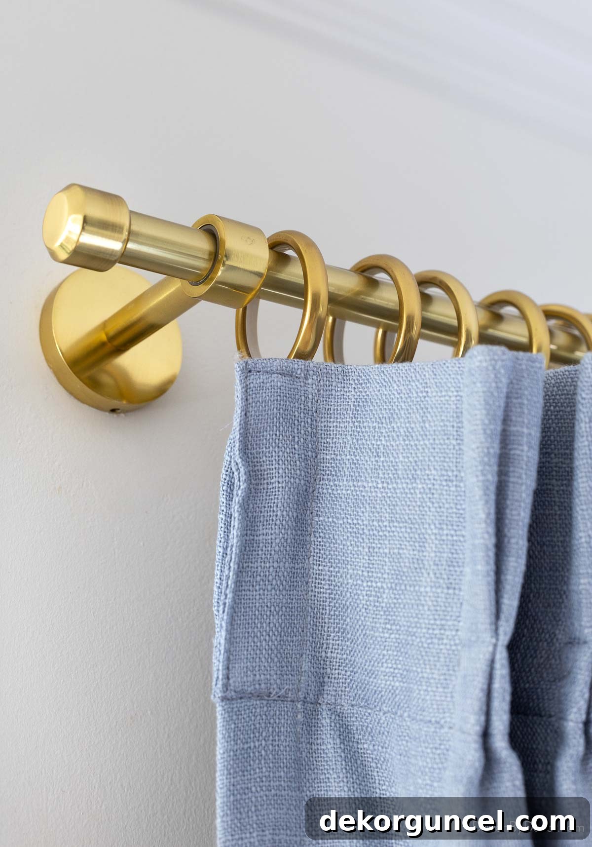Our Breakfast Nook Makeover: Before and After Photos and a Bay Window Curtain Tutorial 12 Aged brass curtain rod with dusty blue curtains