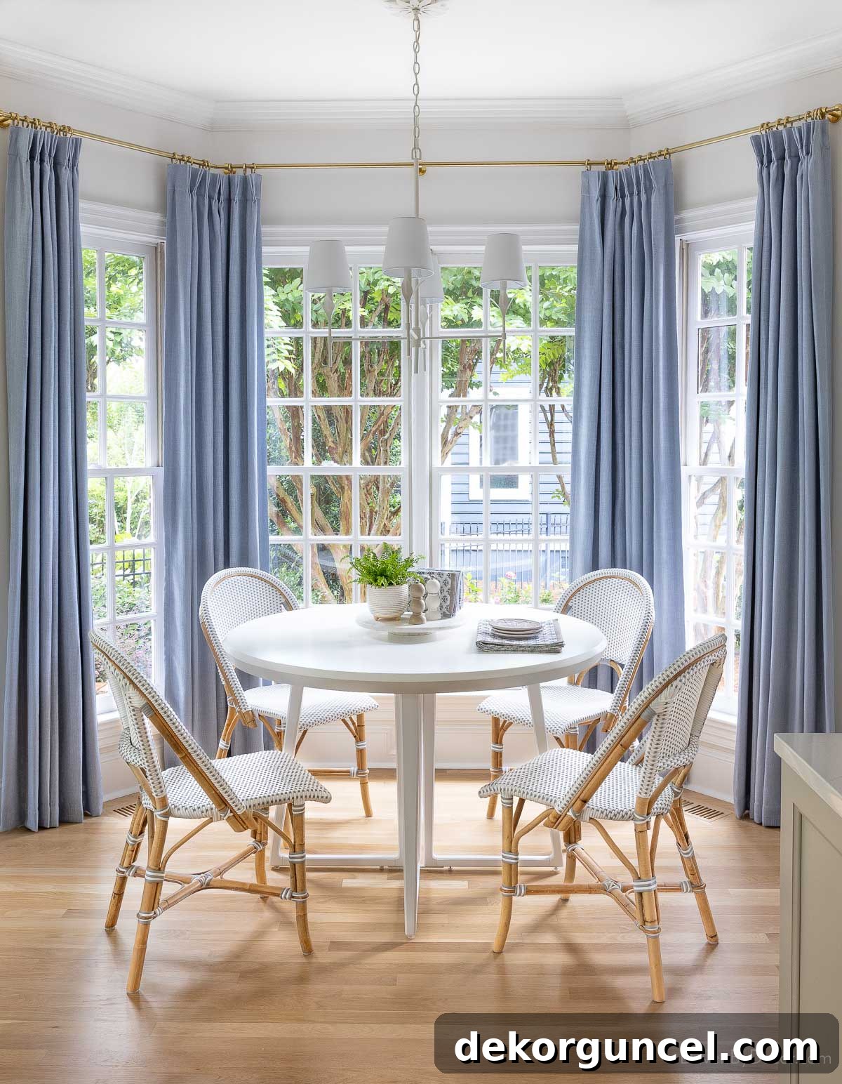 Our Breakfast Nook Makeover: Before and After Photos and a Bay Window Curtain Tutorial 5 Bay window breakfast nook with light blue curtains