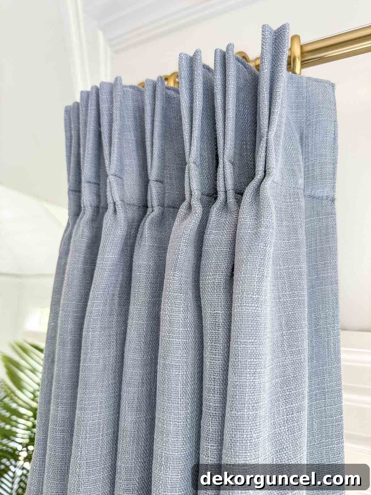 Our Breakfast Nook Makeover: Before and After Photos and a Bay Window Curtain Tutorial 6 Pleated dusty blue curtains in bay window