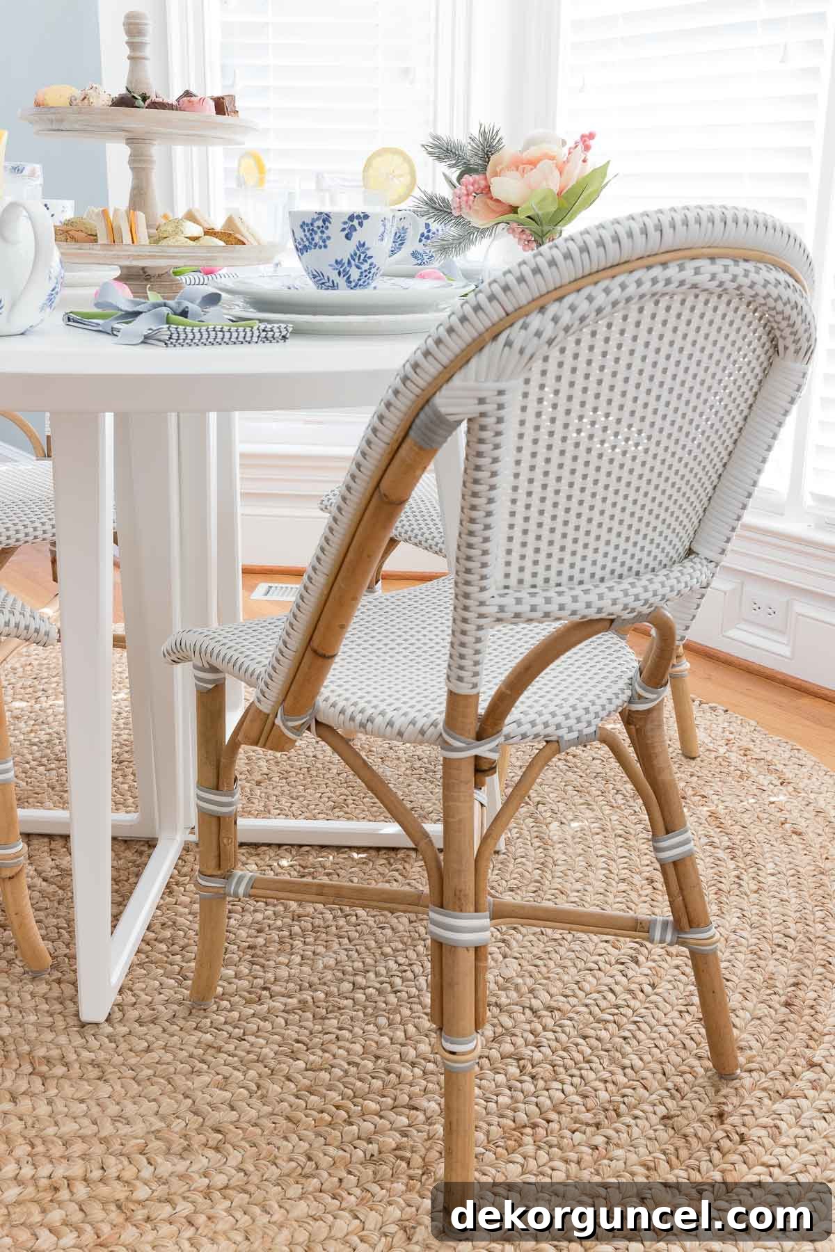 Our Breakfast Nook Makeover: Before and After Photos and a Bay Window Curtain Tutorial 7 Rattan bistro dining chair with gray and white weave seat & back