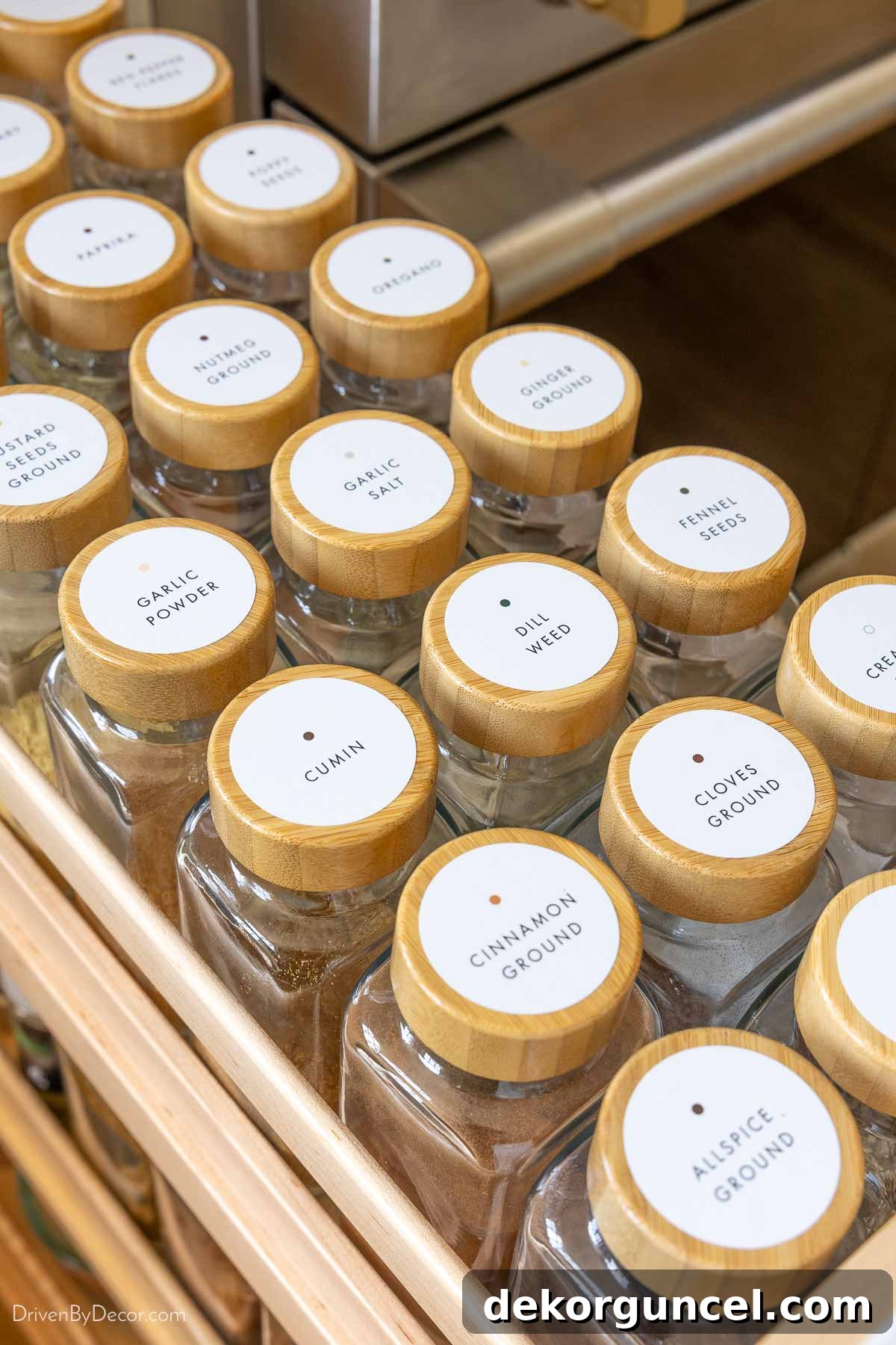 Detailed view of elegant white labels on spice jars, enhancing kitchen organization.