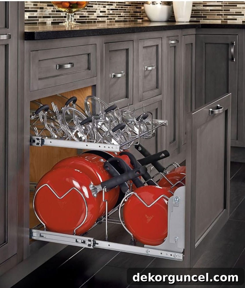 Built-in two-tier cookware organizer within a kitchen cabinet, neatly storing pots, pans, and lids.