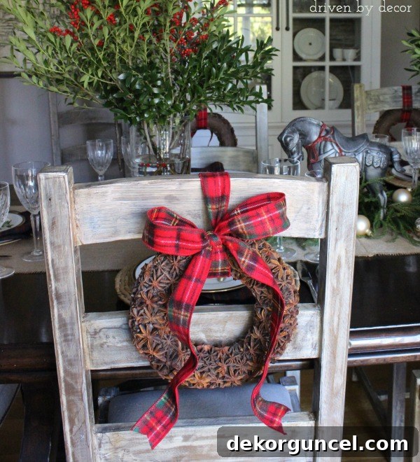 Create Aromatic Star Anise Wreaths 5 Star anise wreaths hung with plaid ribbon on the backs of dining room chairs - love this for Christmas!