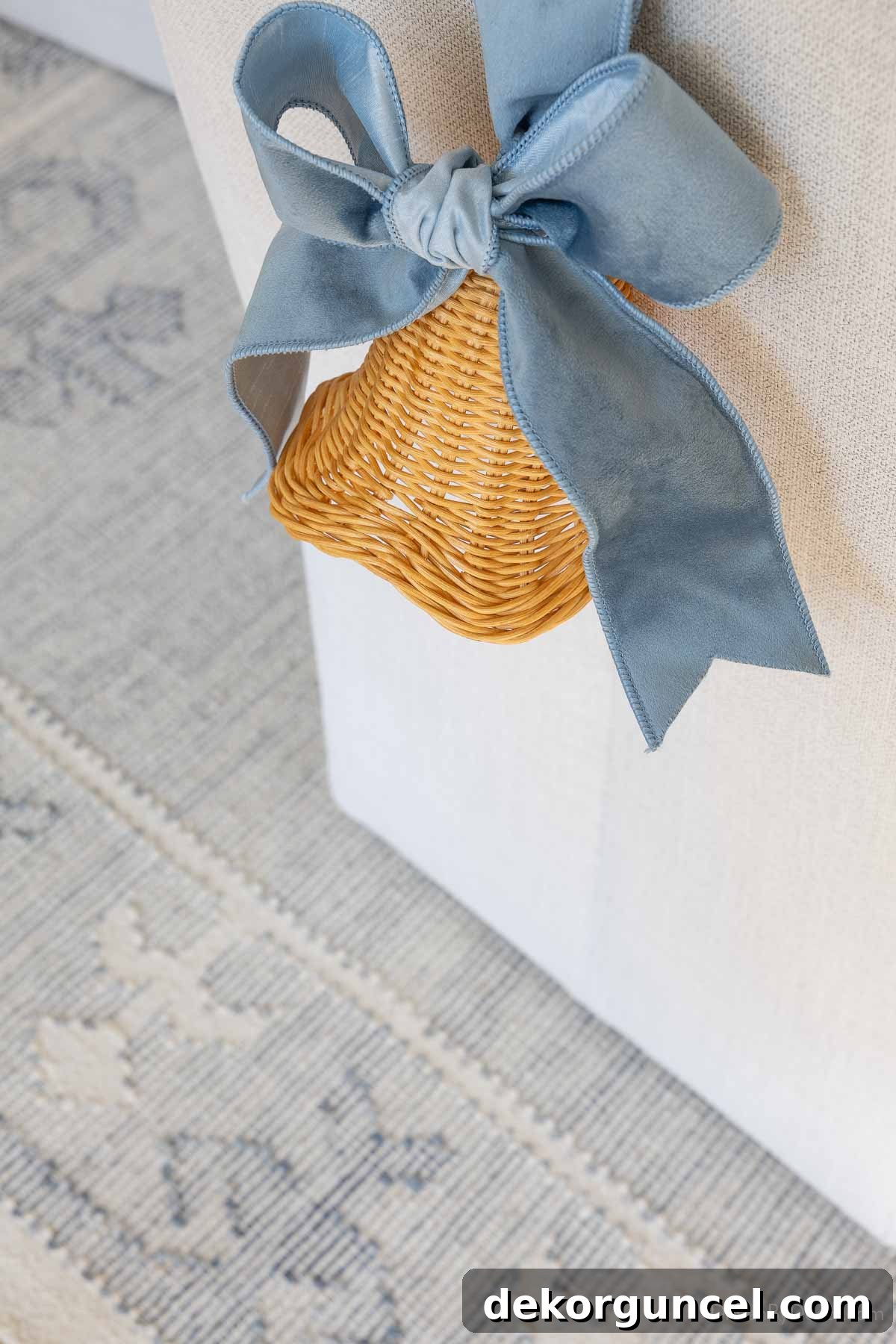 Blue and white patterned rug under a dining table with coastal Christmas decor