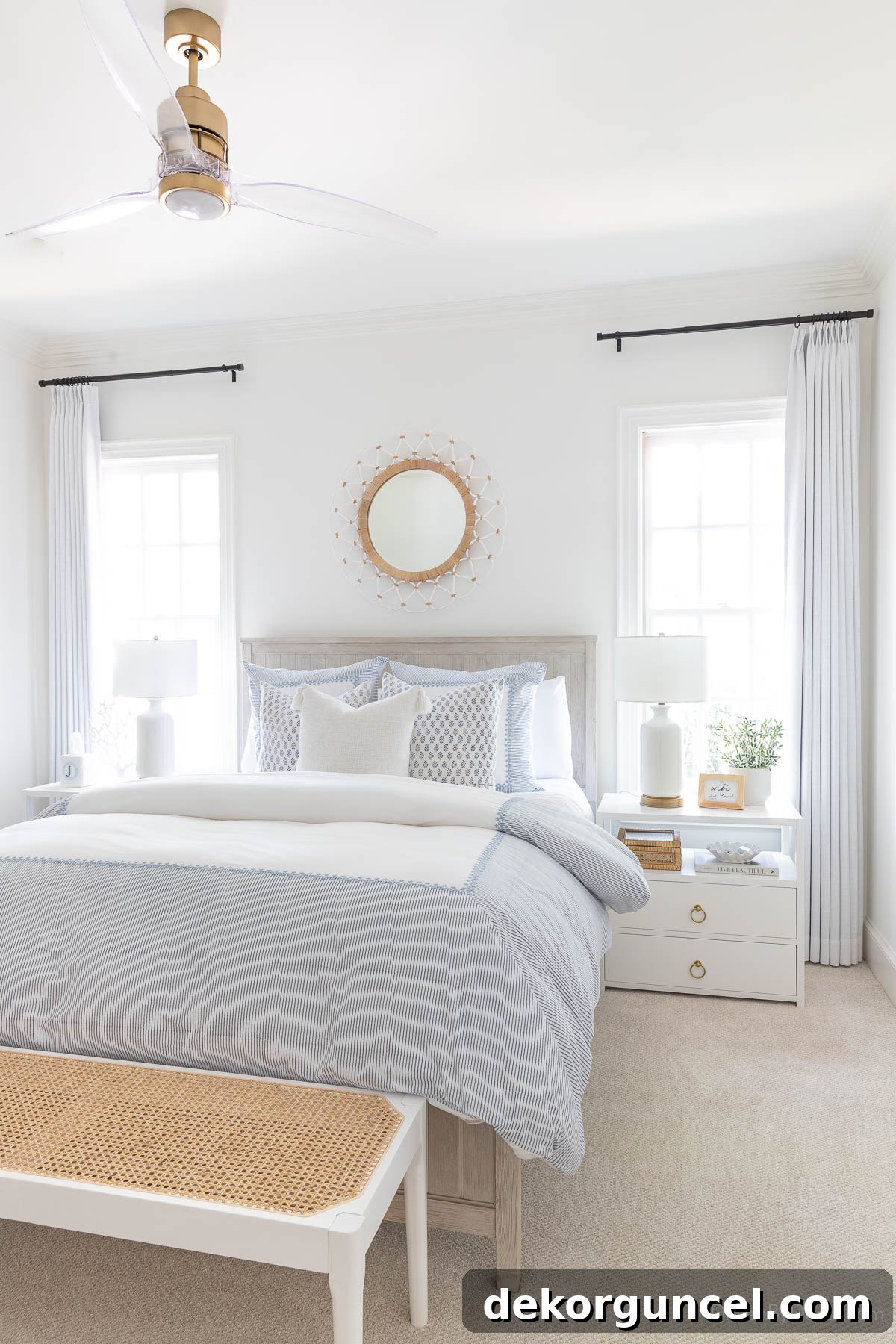 Guest bedroom with glamorous Sonet Satin Brass ceiling fan and clear acrylic blades