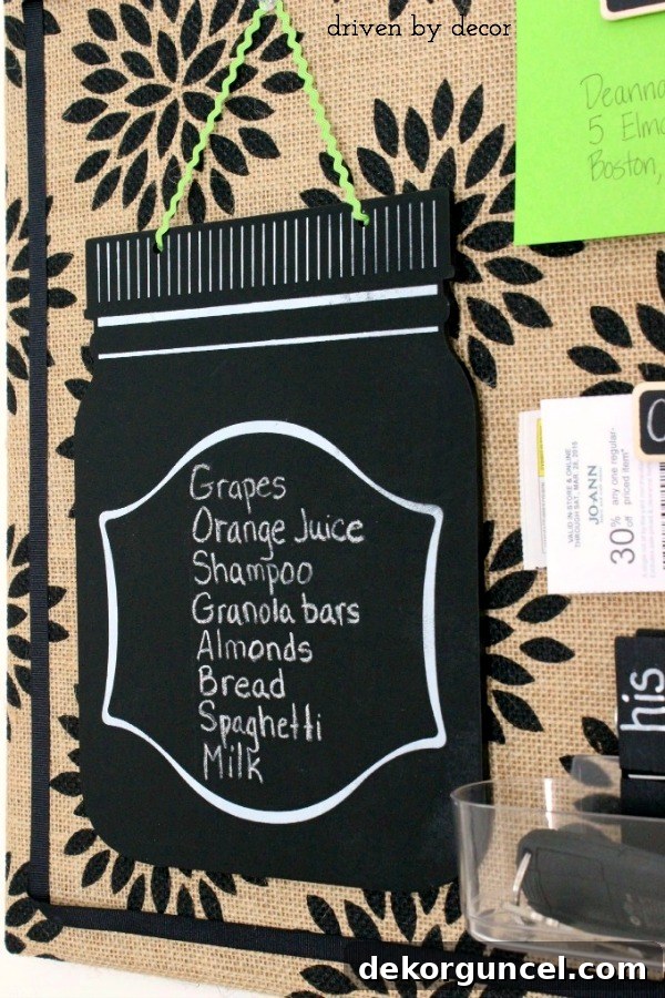 Handcrafted Burlap Pinboard 11 Charming mason jar chalkboard plaque, perfect for grocery lists or family notes on a kitchen bulletin board