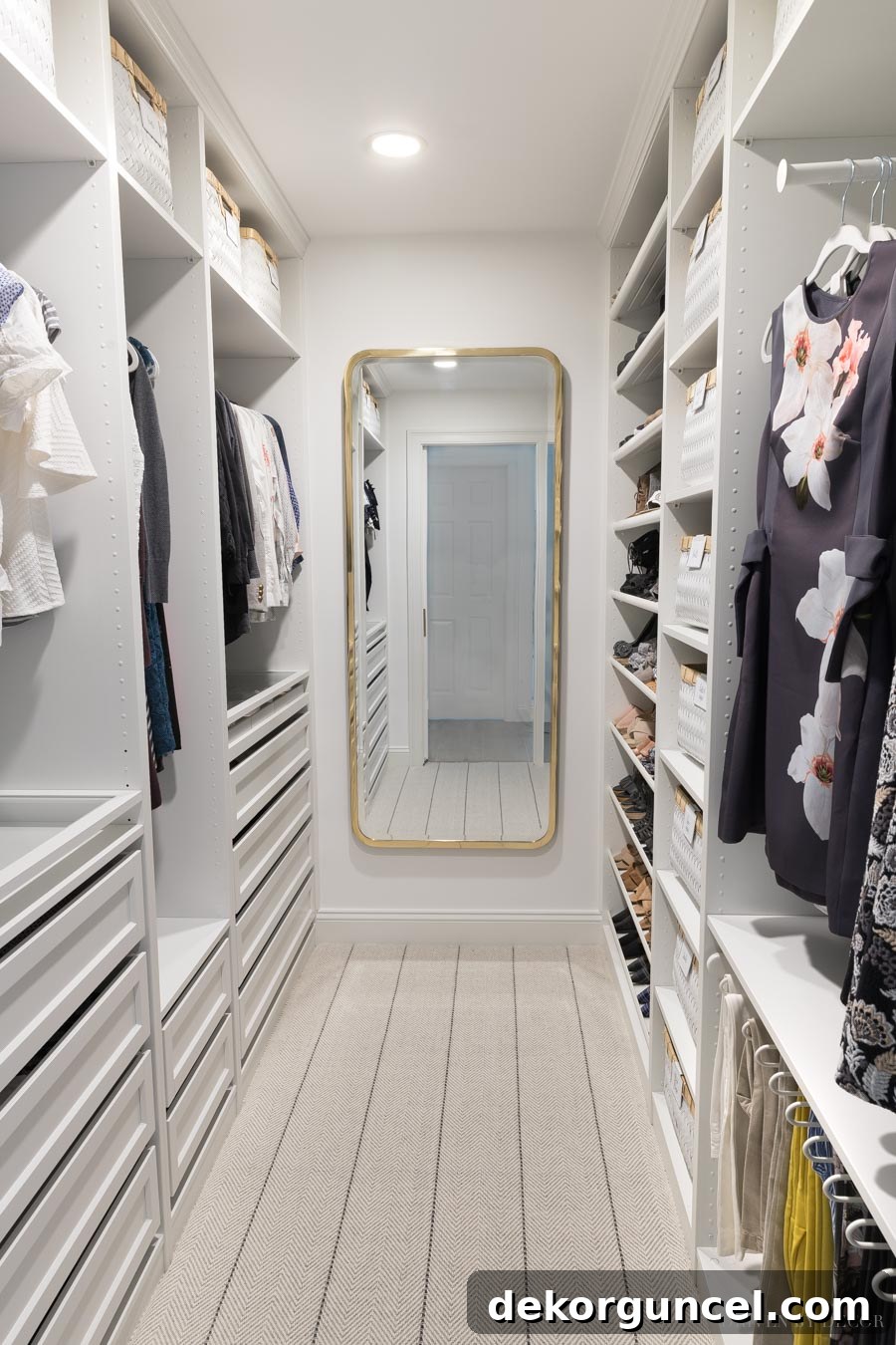 An expansive view of an IKEA PAX walk-in closet, featuring a strategic layout with 22-inch deep wardrobes on the left and 13-inch deep wardrobes on the right.
