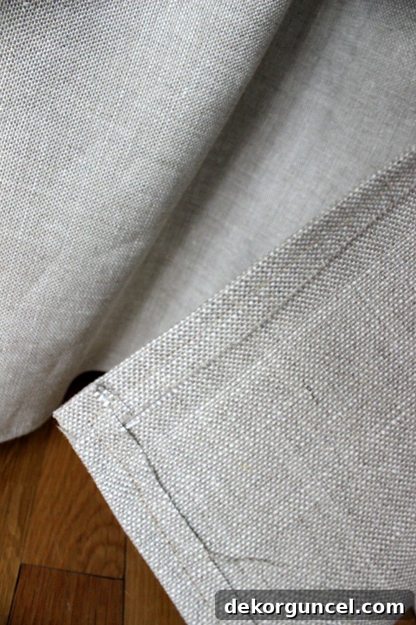 Back side of the fabric used for the desk skirt, demonstrating that imperfections in stitching are hidden