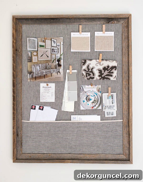 Timeless Ticking Stripe Decorating Ideas 8 DIY fabric covered cork bulletin board with a catch-all pocket, a simple tutorial for kitchen organization.