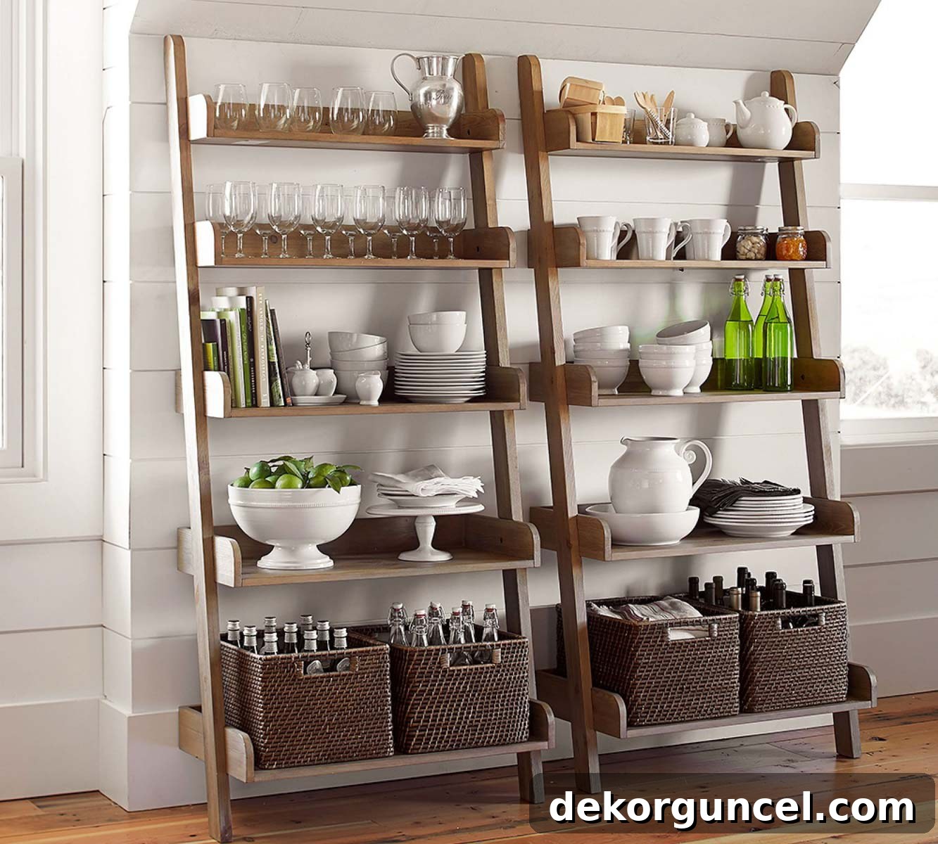 Elevate Your Home Decor With Clever Ladder Designs 13 Ladder shelf with dishes, serving pieces, and other kitchenware stored on the shelves