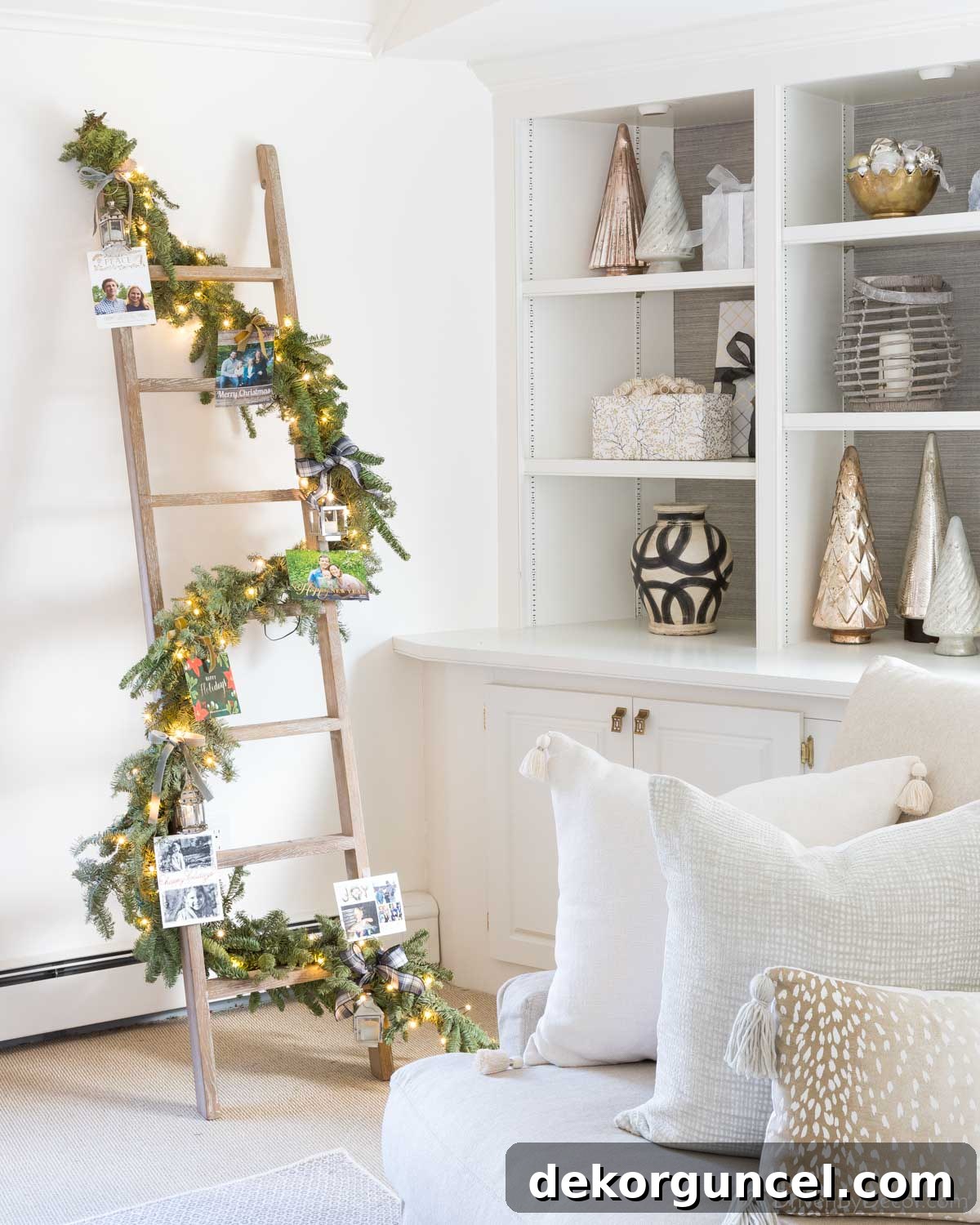 Elevate Your Home Decor With Clever Ladder Designs 6 Decorative ladder with garland, mini lanterns, and lights for Christmas