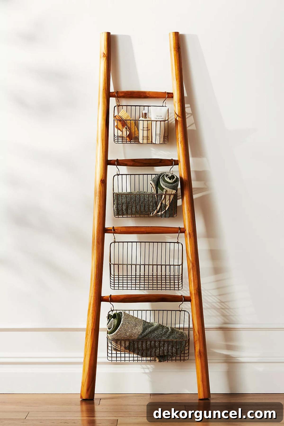 Elevate Your Home Decor With Clever Ladder Designs 9 Decorative ladder with wire bins hanging from rungs