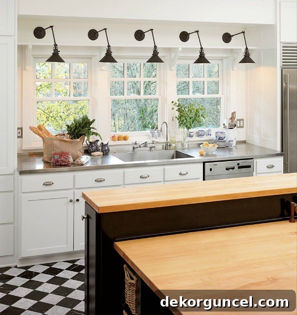 Swing arm sconces in the kitchen - love this look!