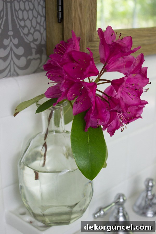 Lettering removed from a bourbon bottle to make a beautiful bud vase