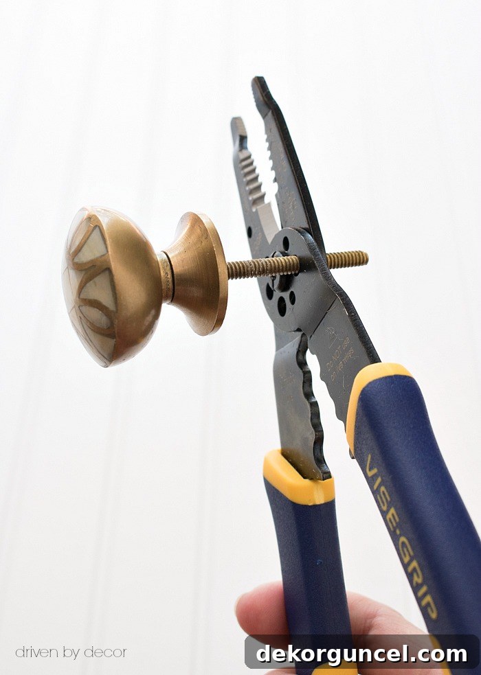 A simple yet essential tool for accurately shortening cabinet knob posts, ensuring a flush finish.