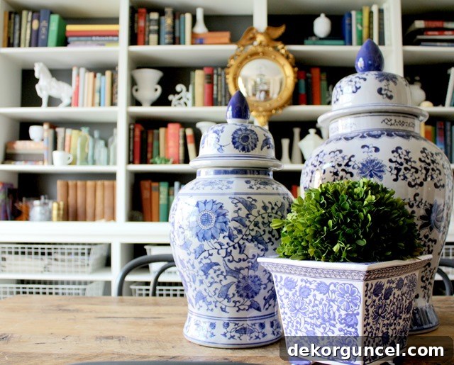 A diverse collection of blue and white vases and jars showcasing various shapes and patterns.