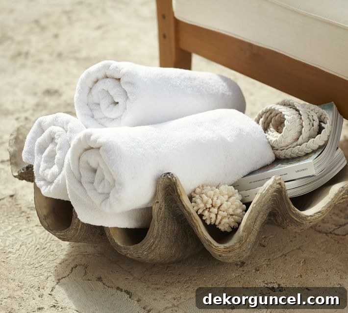 This faux giant clam shell is a stylish way to store towels by a pool or in a bathroom!