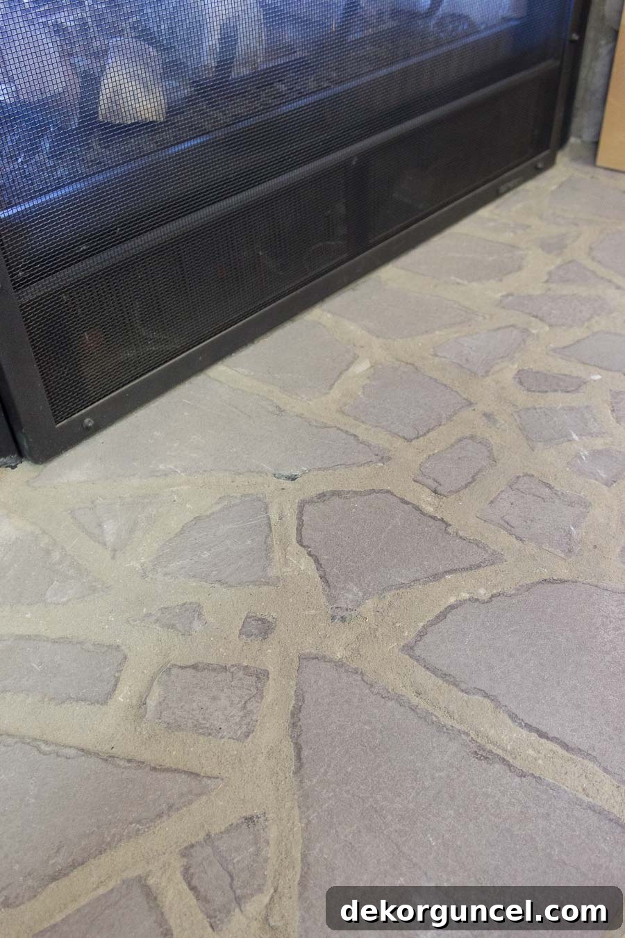 Stone Fireplace Designs Youll Love 12 Broken up hearthstones with mortar in between