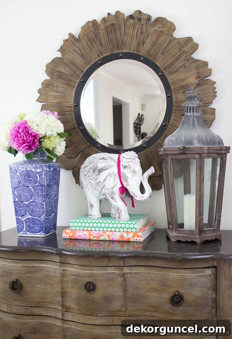 No-Sew Fabric Book Covers 11 Stacked books with decorative fabric covers add a vibrant splash of color and pattern to any home decor, especially in an entryway.