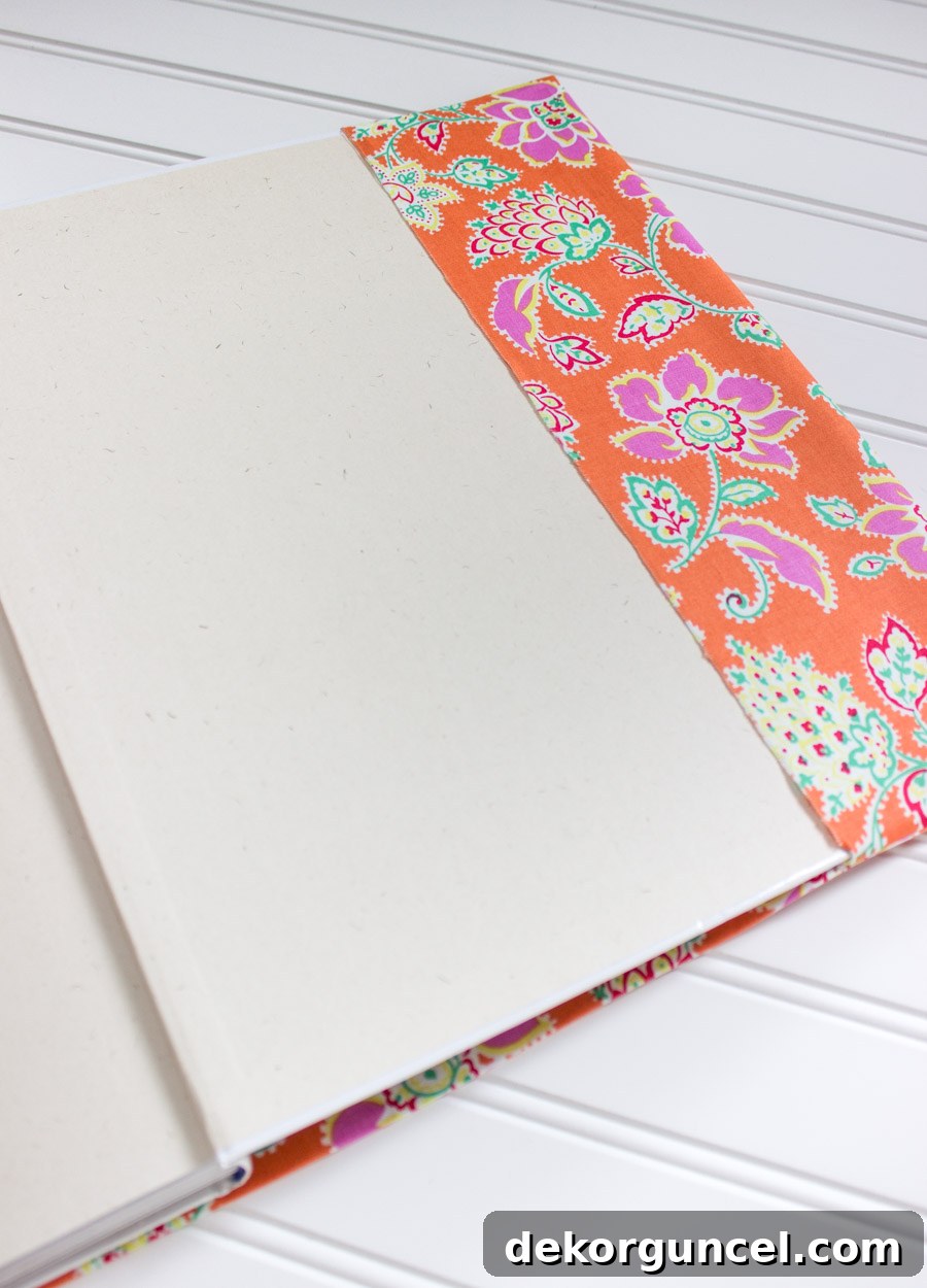 No-Sew Fabric Book Covers 10 The final step: sliding your book into its stunning, custom-made no-sew fabric cover!