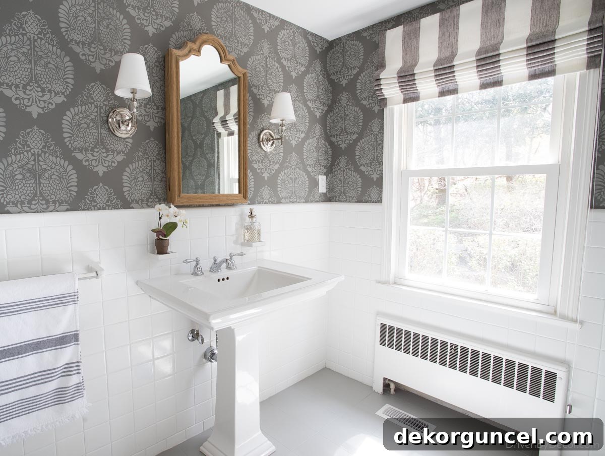 Şablonla Duvarlarınıza Hayat Verin: Büyüleyici Alanlar Yaratın 2 Two-toned gray damask wall stencils create a sophisticated pattern in a powder room, adding depth and visual interest.