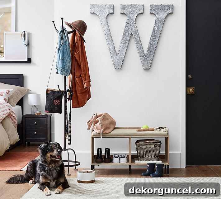 Decorative Letters: Top Sources and Creative Home Decor Ideas 2 A large, rustic galvanized decorative letter 'W' as unique wall art, adding a personal touch to modern farmhouse decor.