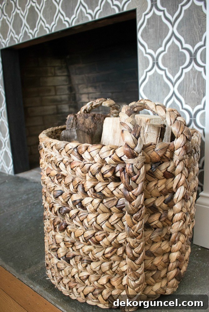 10 Clever Ways to Style Your Home With Baskets 11 This elegant basket, thoughtfully used to store logs by the fireplace, adds both functionality and rustic charm to the living space.