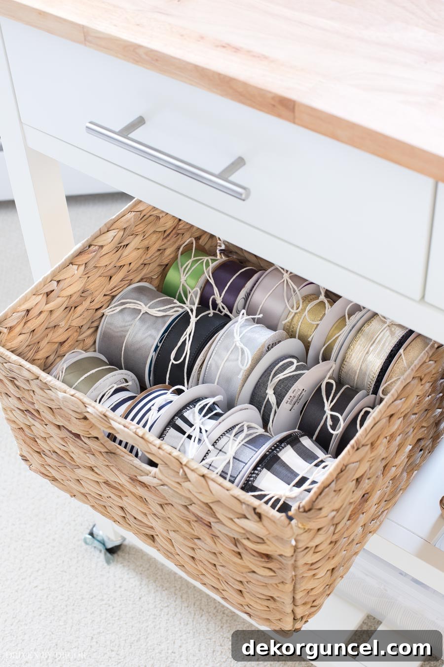 10 Clever Ways to Style Your Home With Baskets 6 A stylish woven basket serves as the perfect holder for spools of ribbon, integral to this super cute and highly functional gift wrapping station.