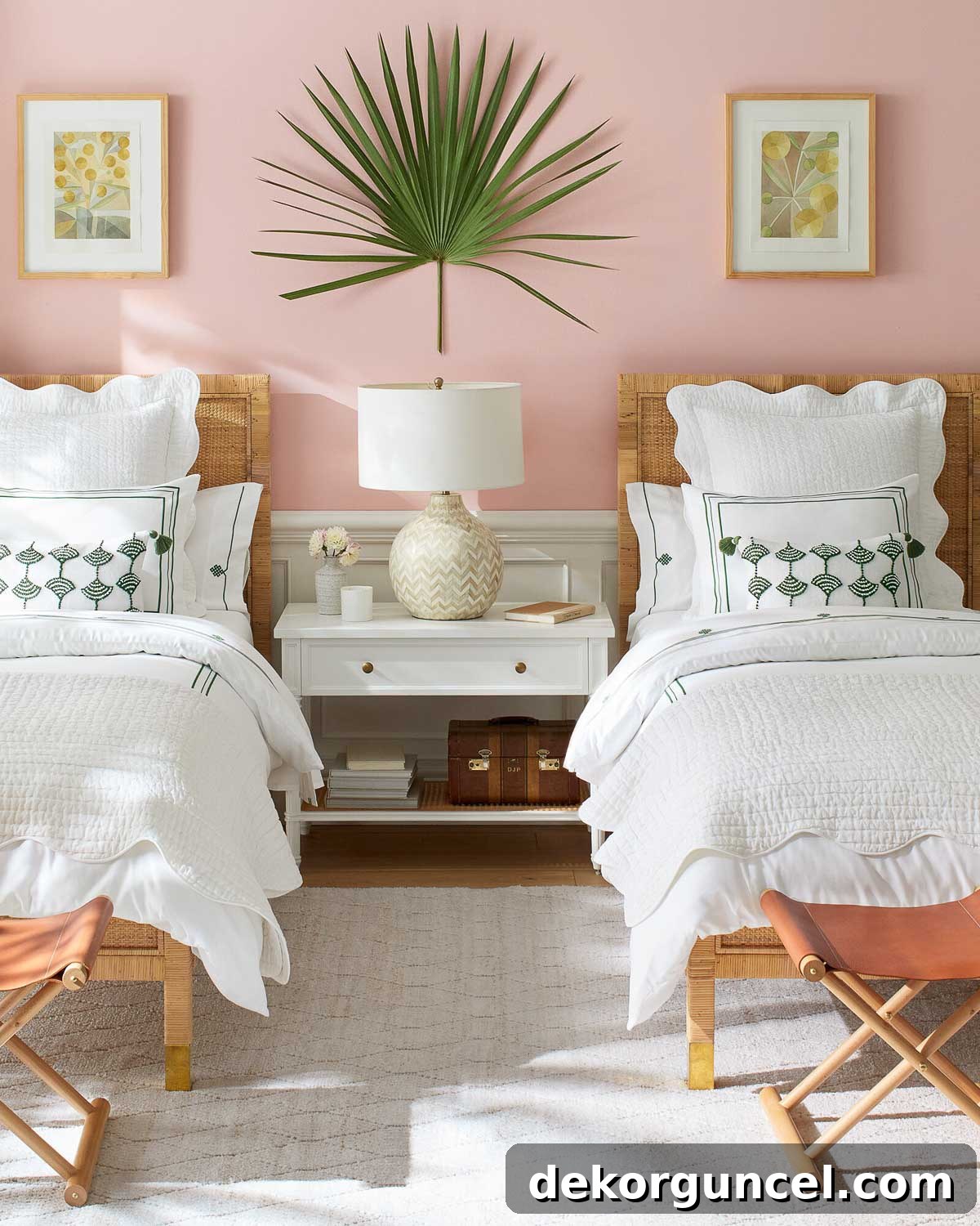 Bedroom with twin beds with x-base stool at foot of each bed