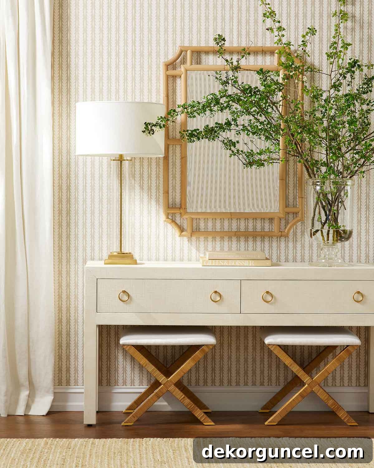 Entryway with console, lamp, mirror, and pair of X-base stools