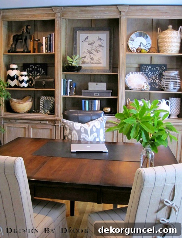 Home Office House Tour - a beautifully organized home office with custom built-in bookshelves