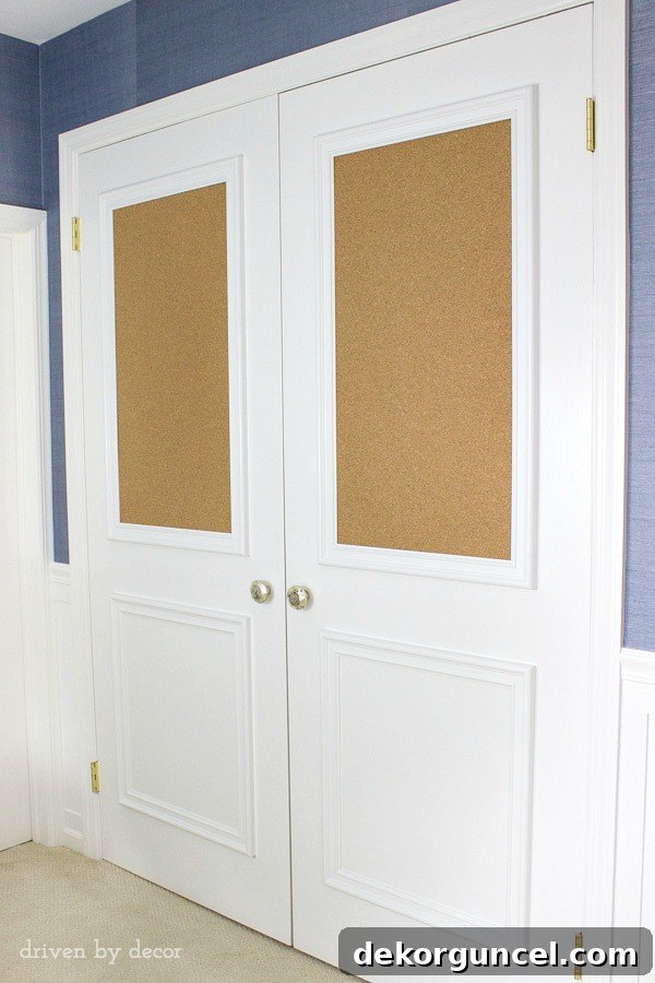 Love this upgrade of flat closet doors! Panel molding was added to both doors, including framed corkboards! So fun for a kid's room!
