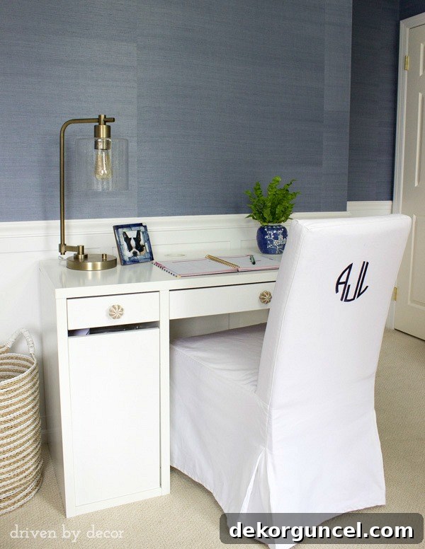 Inexpensive IKEA desk and slipcovered chair and Target lamp - perfect for a kid's room!
