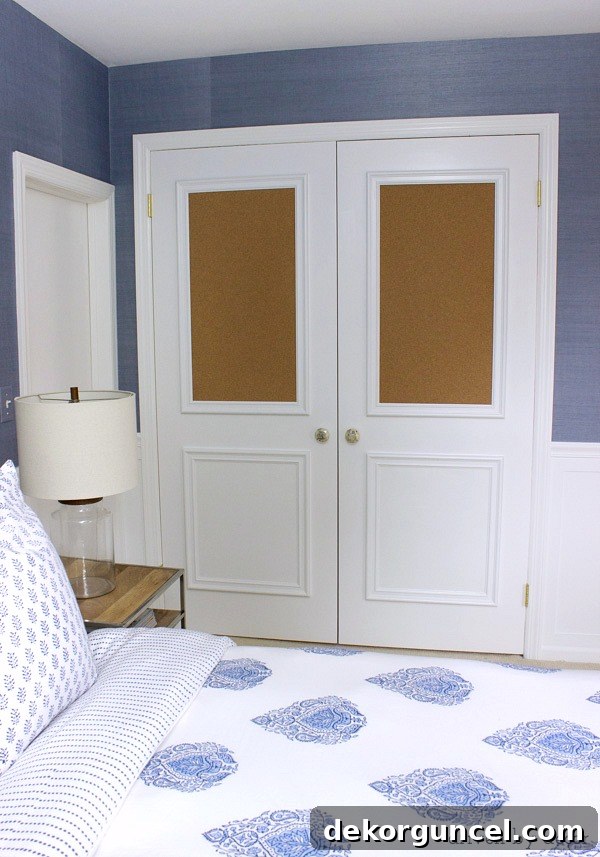 Flat closet doors framed out with panel molding including two cork boards - love for a kid's room!