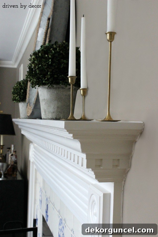 Side profile view of the shallow and uninspired old fireplace mantelpiece