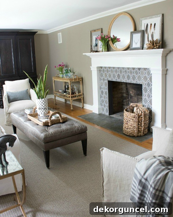 My Life Is Their Blog 4 A warm and inviting family room decorated in neutrals, featuring a beautifully redesigned fireplace as the central focal point. The furniture is arranged for comfort and style.