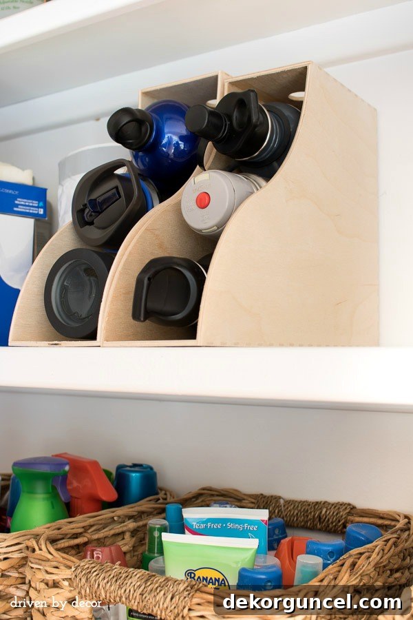 8 Genius Budget Kitchen Hacks 11 Repurpose magazine holders for smart water bottle storage – a clever kitchen organization hack!