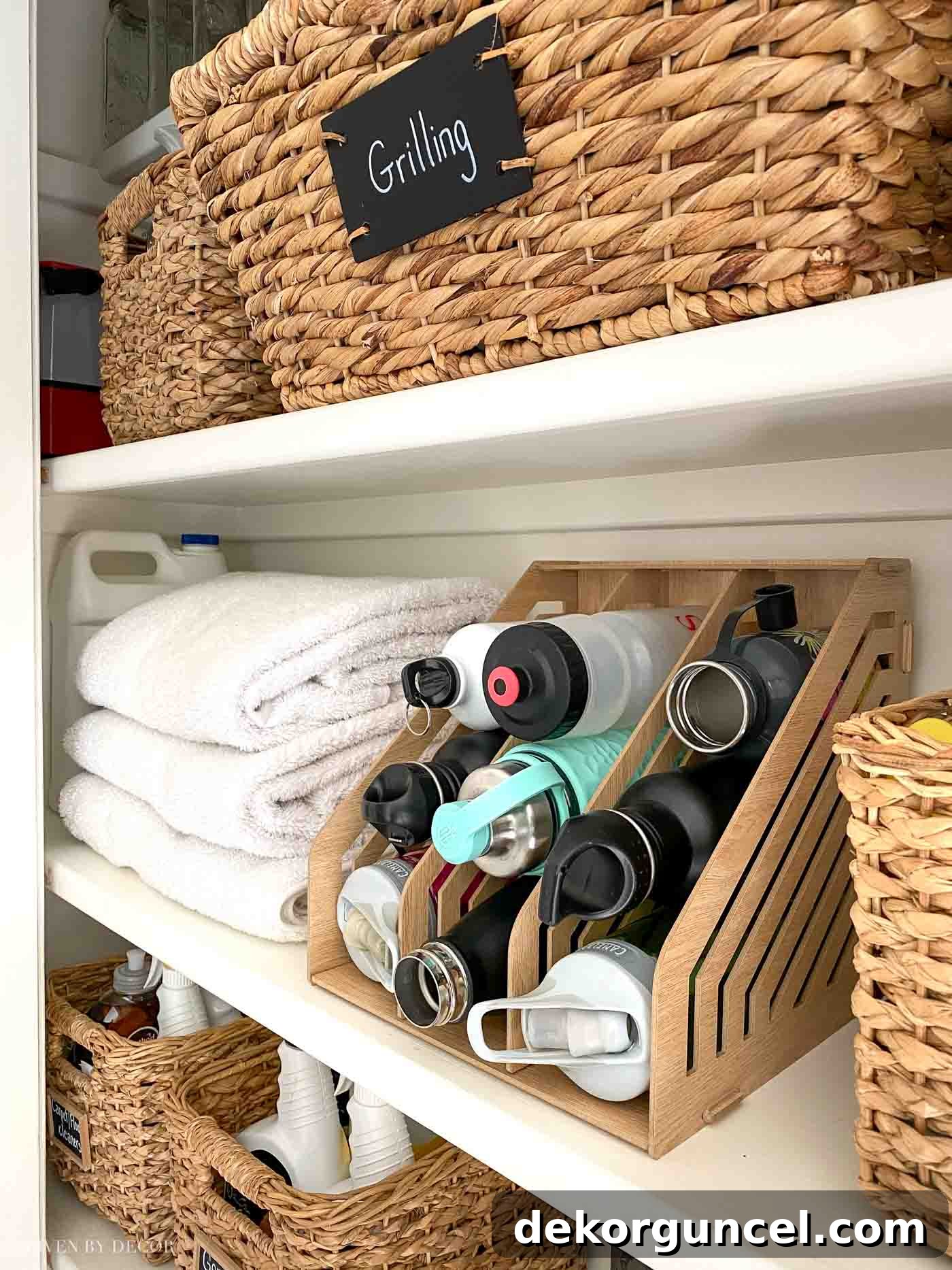 8 Genius Budget Kitchen Hacks 12 Smart kitchen organization idea: a multi-section magazine holder for tidy water bottle storage.