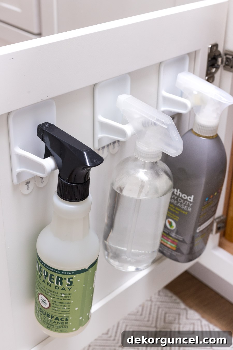 8 Genius Budget Kitchen Hacks 13 Inexpensive hooks on cabinet doors for spray bottles – a genius kitchen organization hack!