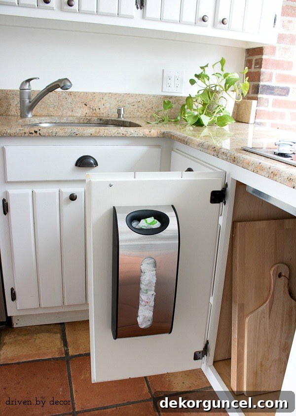 8 Genius Budget Kitchen Hacks 4 A simple grocery bag dispenser: an essential kitchen organization tool for taming plastic bag clutter.