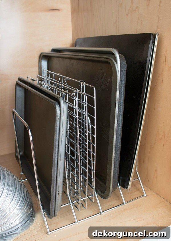 8 Genius Budget Kitchen Hacks 9 Simple metal rack for organized cookie sheets and baking pans – essential kitchen storage!