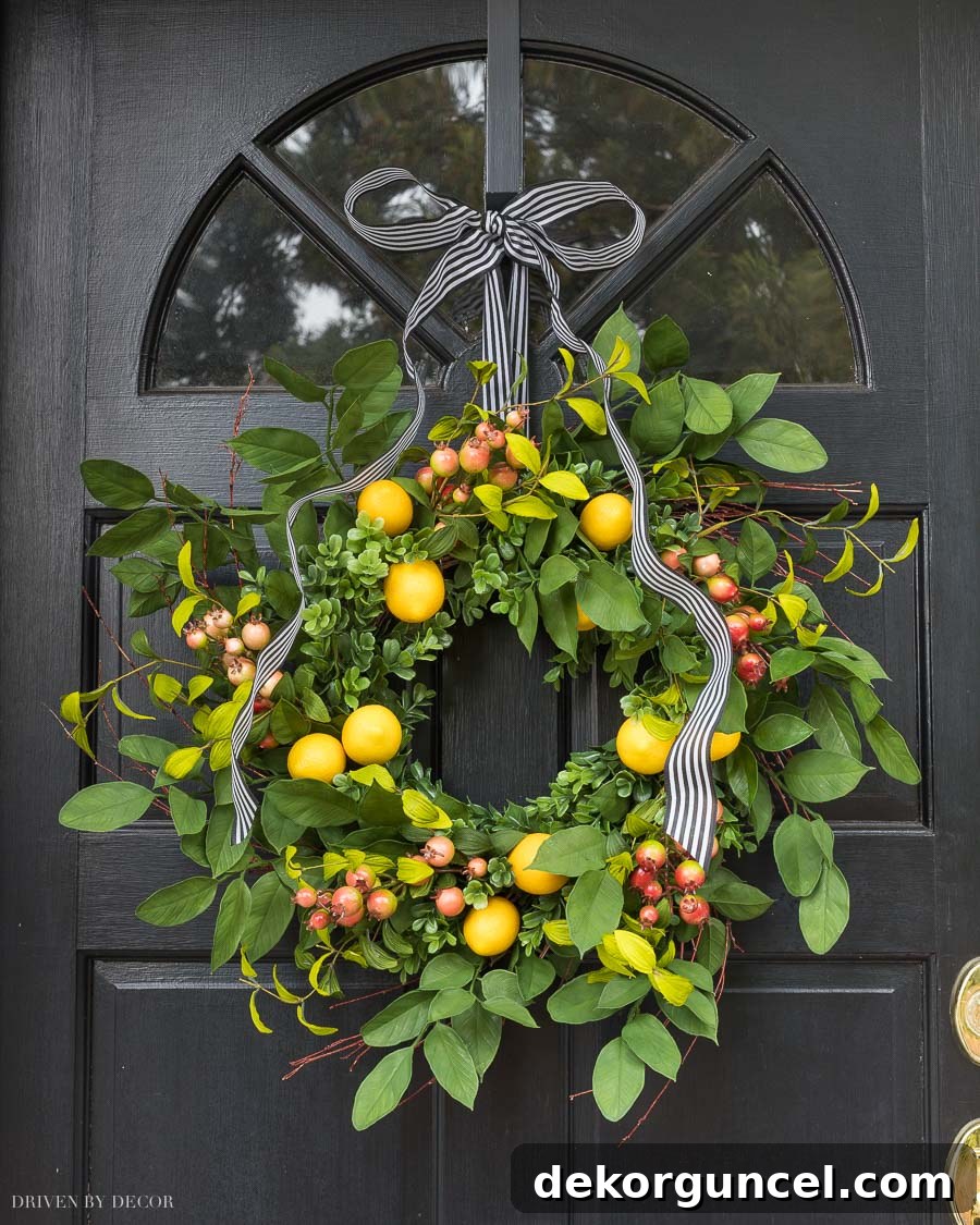 Top Spring Wreaths for a Welcoming Front Door 6 Gorgeous spring wreath adorned with lifelike faux lemons, a vibrant addition to any front door.