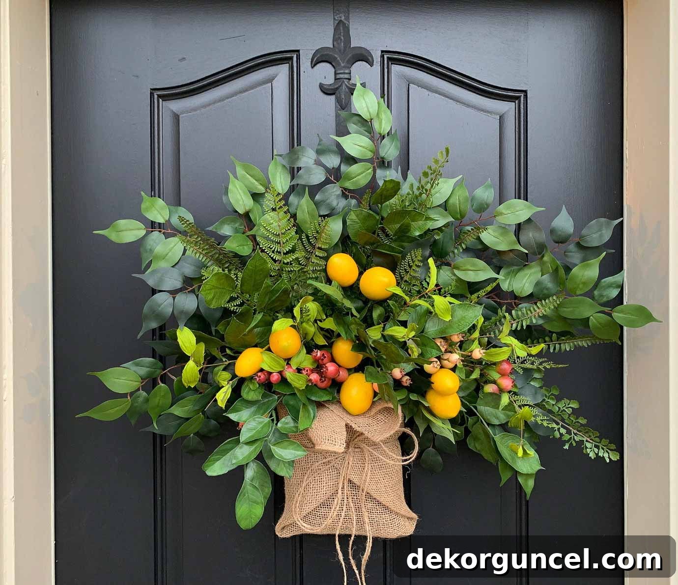 Top Spring Wreaths for a Welcoming Front Door 7 Love this unique spring 'wreath' that resembles a colorful, burlap-wrapped bouquet of fresh flowers!